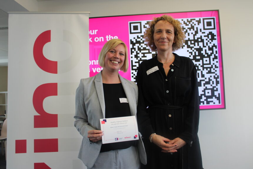 Image of Dr Sue Eldridge receiving award at Zinc VC
